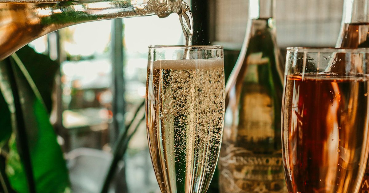Champagne being poured into a flute
