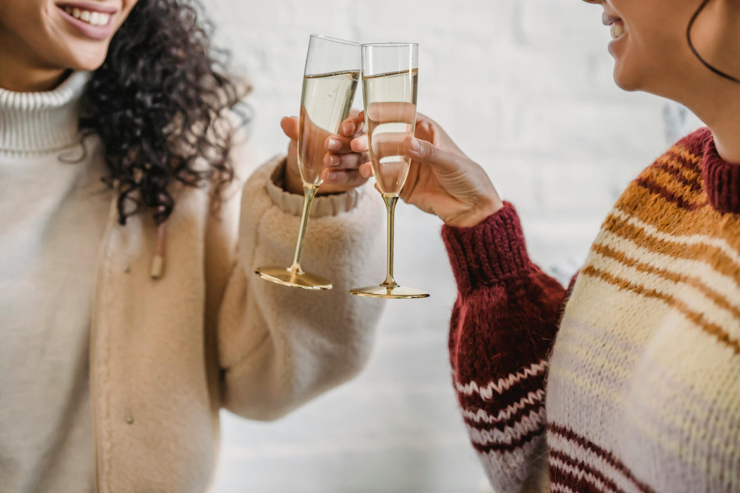 Friends cheers glass of champagne