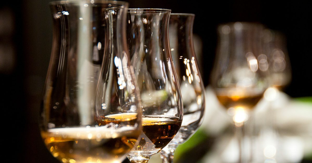 Row of whiskies ready for tasting
